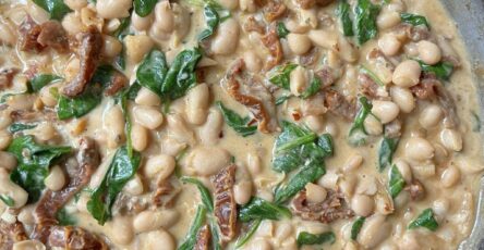 Savor the Comfort of Creamy White Beans with Spinach and Sun-Dried Tomatoes