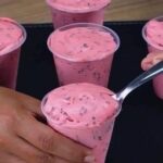 Pink mousse dessert with chocolate chips