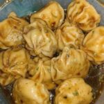 Spicy Dumplings with Soy-Based Sauce