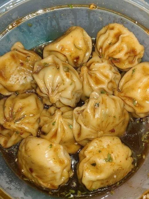 Spicy Dumplings with Soy-Based Sauce