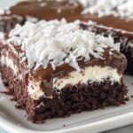 Mounds Poke Cake