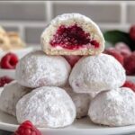 Raspberry Filled Almond Snowball Cookies