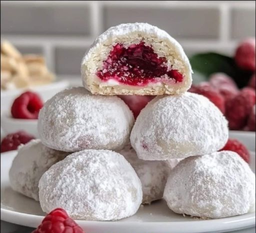 Raspberry Filled Almond Snowball Cookies