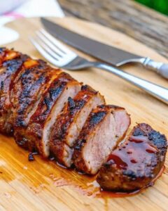 Perfectly cooked pork tenderloin with smoky spice rub and glaze