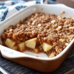 Amish Orchard Sweetness apple crisp-style dessert with baked apples, oats, and golden buttery crumble