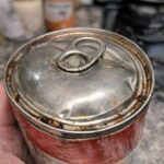 puffed or dented can lid safety